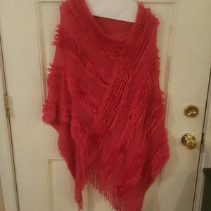 Pink shawl, jumpsuit, vest  coach bags,